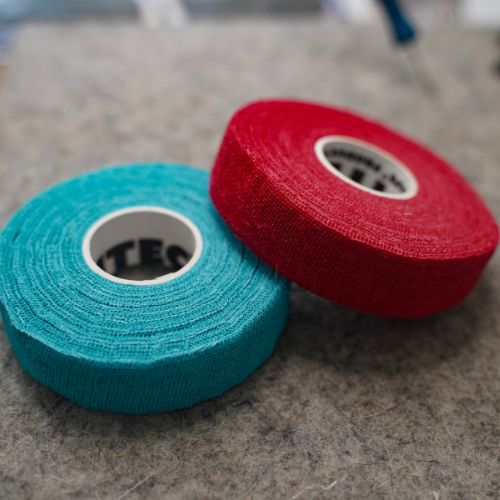 rolls of Thimble Tape – Reusable Needle Felting Finger Protector shown in Acid Wash and Cherry Soda