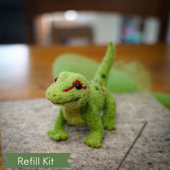 Green needle felted gecko
